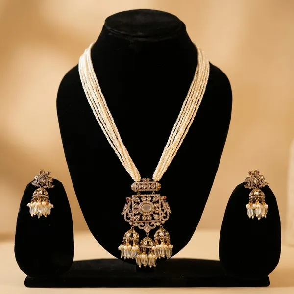 Elegant_Gold_Toned_Kundan_Necklace_Set_With_White_Beads