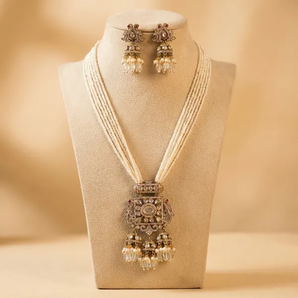 Elegant_Gold_Toned_Kundan_Necklace_Set_With_White_Beads
