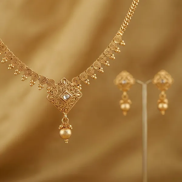 Traditional_Gold_Toned_Necklace_And_Earrings_Jewelry_Set_With_Crystal_Embellishments