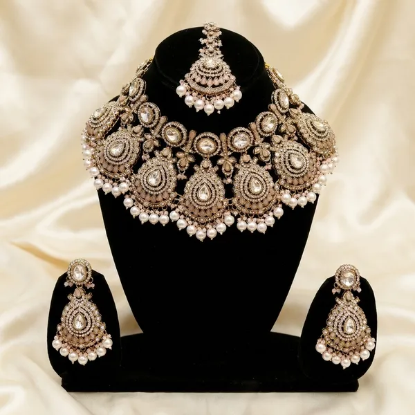 Traditional_Gold_Toned_Kundan_Bridal_Necklace_Set_With_Pearls_And_Pink_Accents