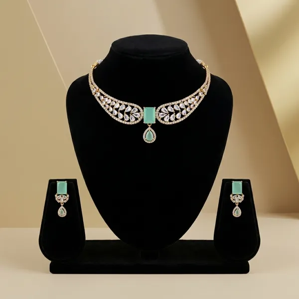 Elegant_Gold_Toned_Crescent_Moon_Necklace_With_Teal_Stone_Accent