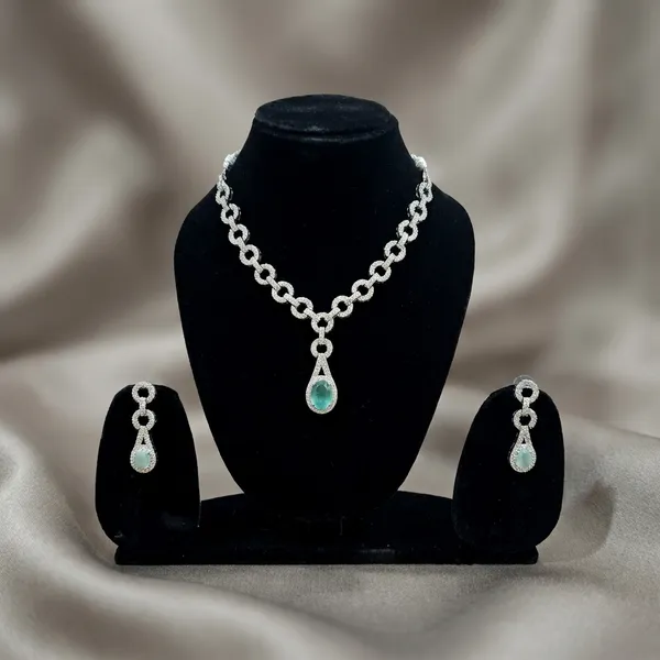 Elegant_Silver_Toned_Chain_Necklace_Set_With_Green_Stone_Pendant_And_Matching_Earrings