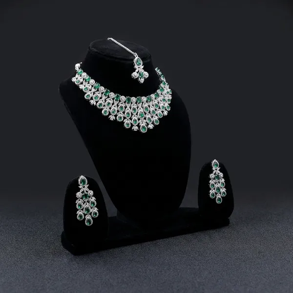 Silver_And_Green_Stone_Studded_Kundan_Necklace_Set_With_Maang_Tikka