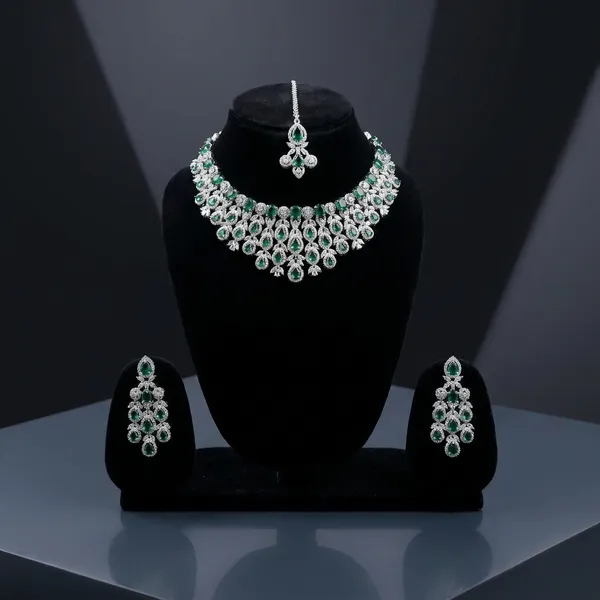 Silver_And_Green_Stone_Studded_Kundan_Necklace_Set_With_Maang_Tikka