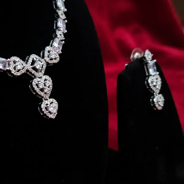Elegant_Silver_Toned_Crystal_Necklace_And_Earrings_Set
