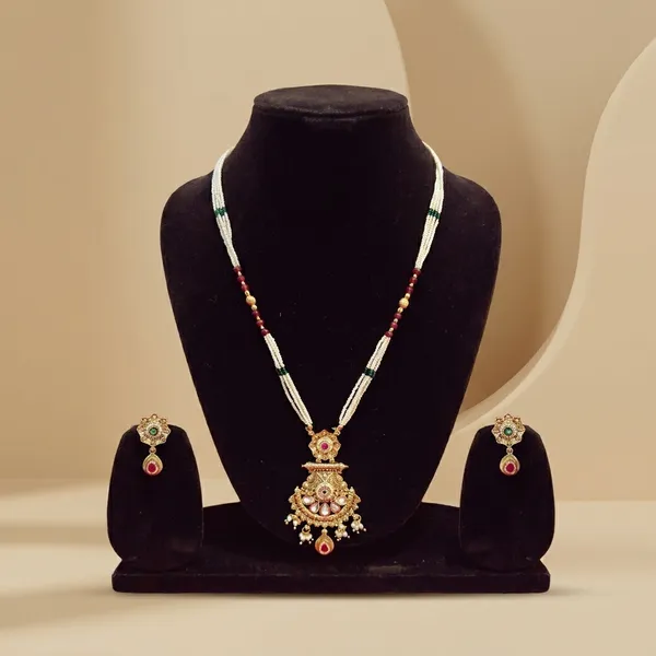 Elegant_Gold_Toned_Kundan_Necklace_Set_With_Pearl_Beads_And_Matching_Earrings