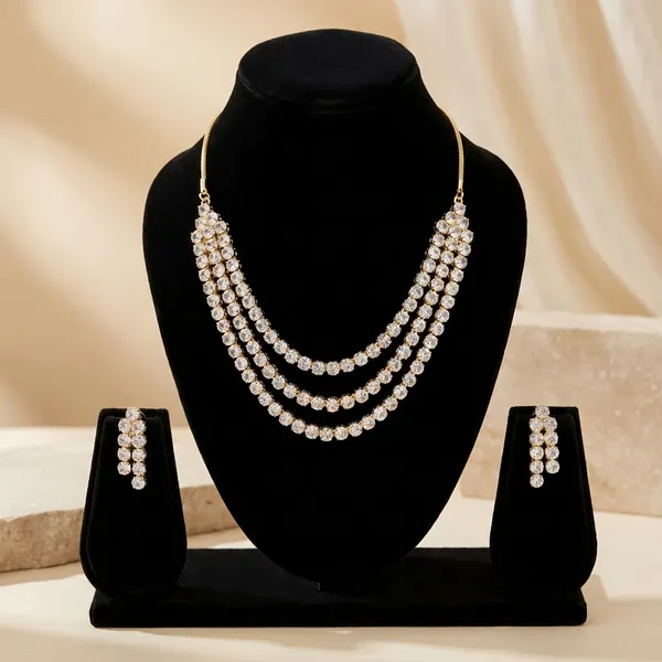 Elegant_Three_Strand_Pearl_Necklace_With_Matching_Earrings