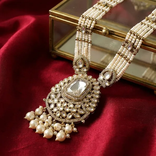 Elegant_Silver_Toned_Crystal_Necklace_With_Ornate_Pendant