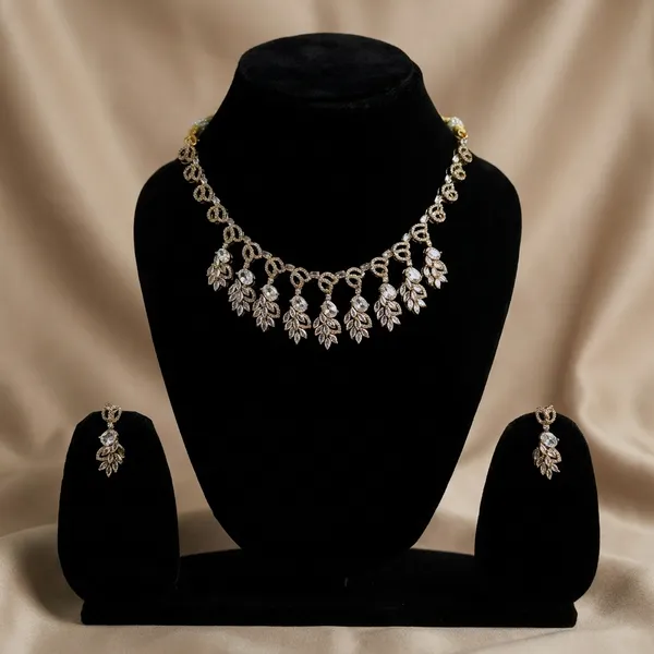 Elegant_Silver_Toned_Anklet_With_Floral_Motif_And_Matching_Toe_Ring