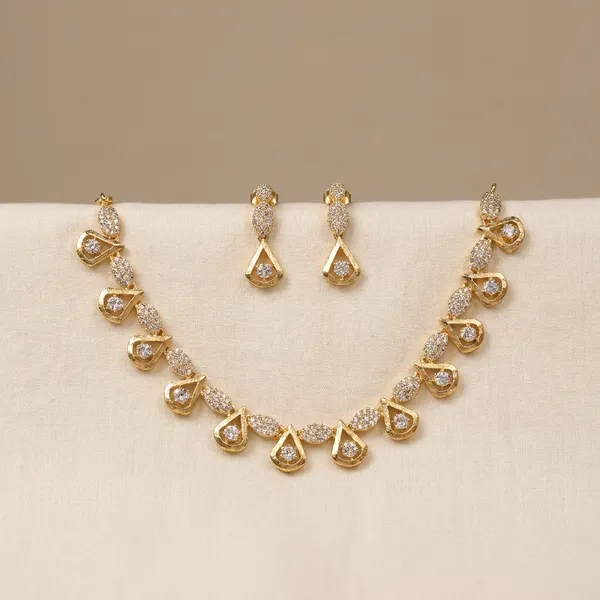 Gold_Toned_Traditional_Necklace_And_Earring_Set_With_Peacock_Motif