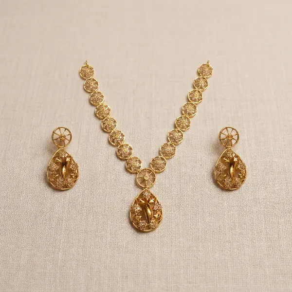 Gold_Toned_Decorative_Bracelet_With_Floral_Medallions_And_Pendant_Charms
