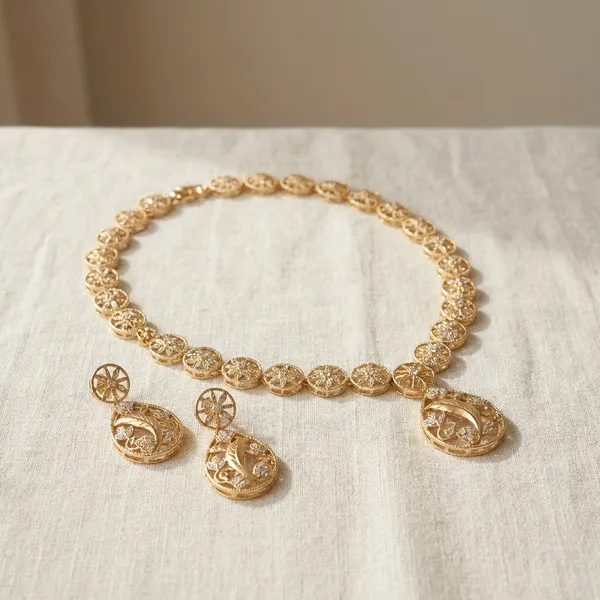 Gold_Toned_Decorative_Bracelet_With_Floral_Medallions_And_Pendant_Charms