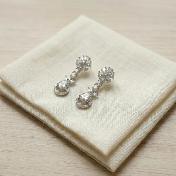 Silver_Toned_Elegant_Drop_Earrings_With_Crystal_Embellishments