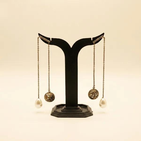 Elegant_Pearl_Drop_Earrings_With_Decorative_Spheres