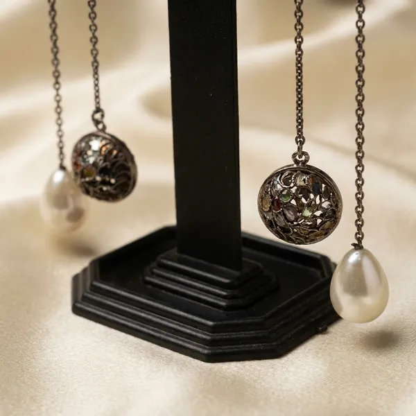 Elegant_Pearl_Drop_Earrings_With_Decorative_Spheres