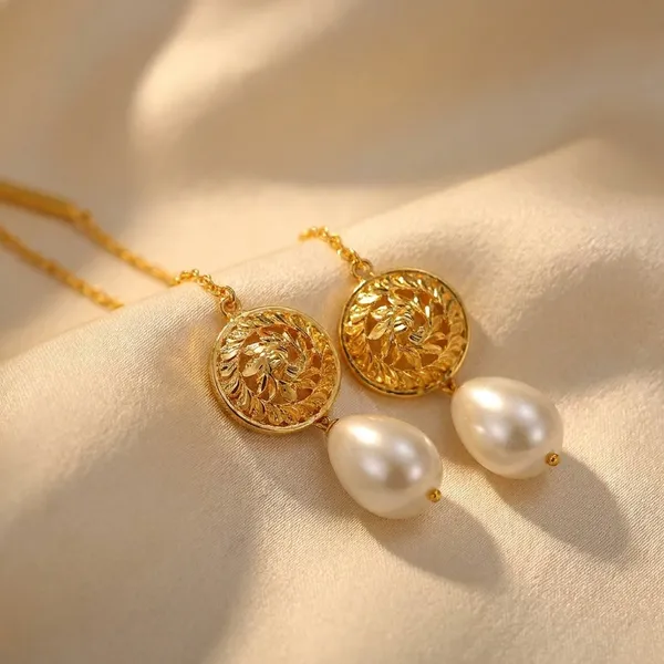 Gold-Toned_Chain_Drop_Earrings_With_Textured_Medallion_And_Pearl_Dangles