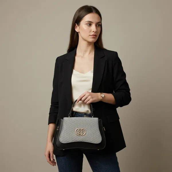 Stylish_Black_And_White_Striped_Flap_Handbag_With_Gold_Accent_Hardware