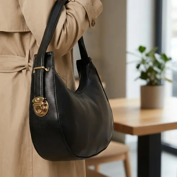 Classic_Black_Crescent_Shoulder_Bag_With_Gold_Hardware
