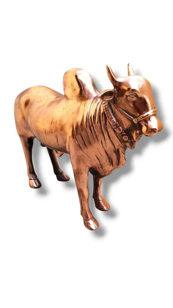 Grab_this_stunning_bronze_cow_sculpture,_a_masterpiece_of_craftsmanship_that_captures_every_intricate_detail—from_the_sleek_harness_to_the_textured_skin_folds—giving_it_a_lifelike_presence._The_rich_copper‑brown_finish_adds_a_luxurious,_antique_vibe_perfect_for_upscale_décor._Ideal_for_gifting_-_13