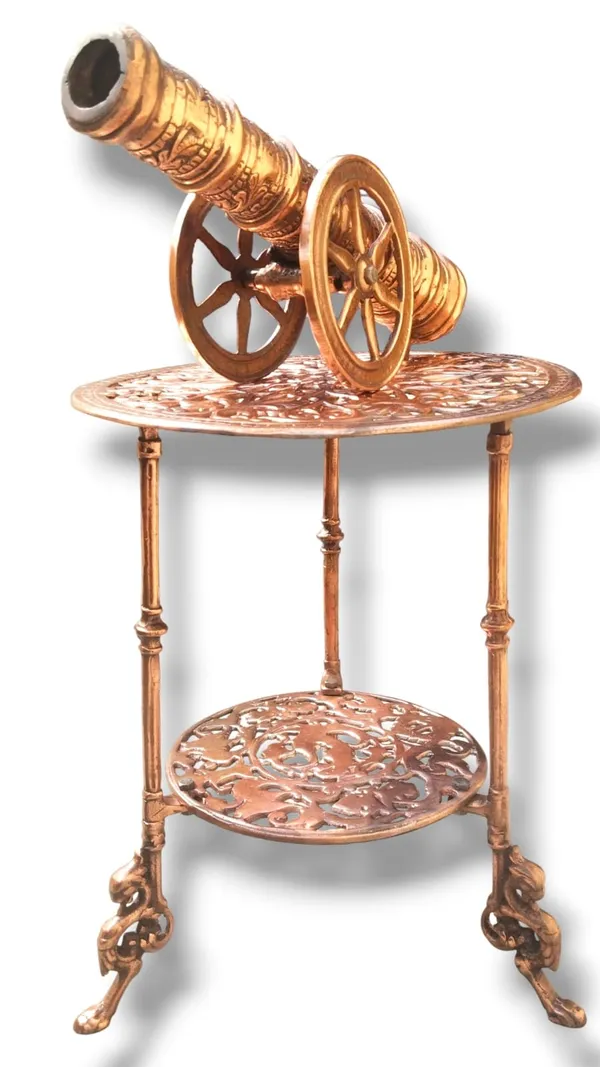 THE_EXQUISITE_ANTIQUE-STYLE_COPPER_FINISHED_METAL_SIDE_TABLE_PAIRED_WITH_A_DETAILED_CANNON_SCULPTURE.