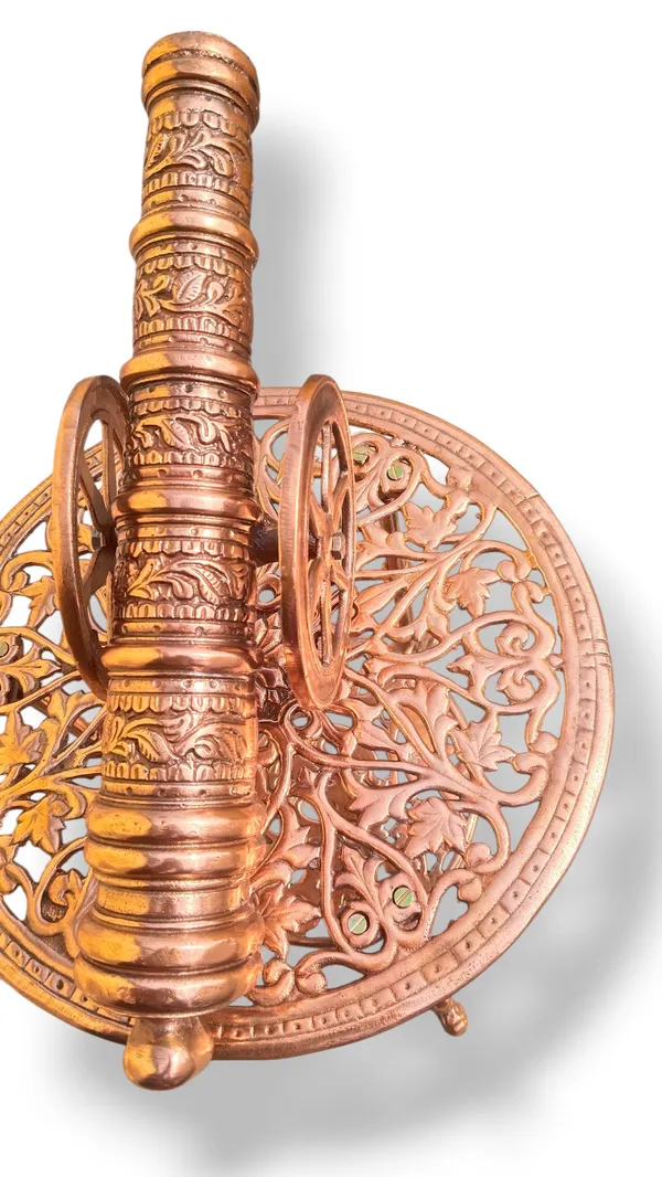 THE_EXQUISITE_ANTIQUE-STYLE_COPPER_FINISHED_METAL_SIDE_TABLE_PAIRED_WITH_A_DETAILED_CANNON_SCULPTURE.