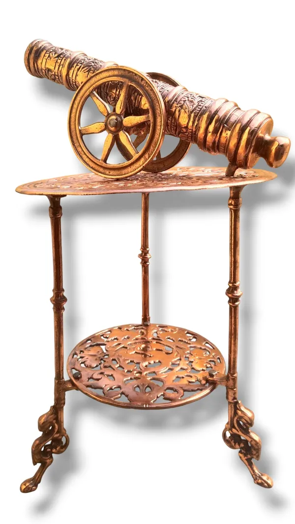 THE_EXQUISITE_ANTIQUE-STYLE_COPPER_FINISHED_METAL_SIDE_TABLE_PAIRED_WITH_A_DETAILED_CANNON_SCULPTURE.
