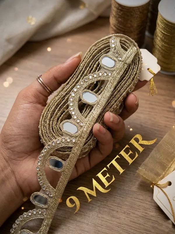 Add_a_touch_of_radiant_glamour_to_your_traditional_wear_with_this_stunning__9-meter_gold_lace_border,_featuring_a_gorgeous_design_of_shimmering_mirrors_and_sparkling_Diamonds_embellishments