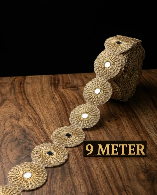 Enhance_your_ethnic_creations_with_this_striking_9-meter_gold_lace_border,_featuring_a_continuous_chain_of_ornate,_circular_floral_medallions_embedded_with_central_mirrors._Perfect_for_adding_traditional_charm_and_rich_texture_to_sarees,_lehengas,_and_festive_outfits,_this_unique_trim_brings_an_exquisite,_eye-catching_finish_to_your_designer_wardrobe.