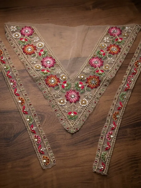 Exquisitely_crafted_net_neck_patch_and_border_set_featuring_vibrant_multi-colored_floral_embroidery,_delicate_threadwork,_and_shimmering_mirror_accents_on_a_sheer_beige_base._Perfect_for_adding_a_designer_touch_to_ethnic_blouses,_kurtis,_and_custom_garments.