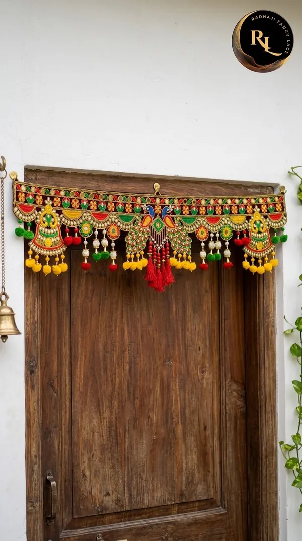Festive_Door_Toran_/_Bandhanwar_with_Royal_Peacock_Motifs,_Mirror_Work,_and_Colorful_Hanging_Tassels