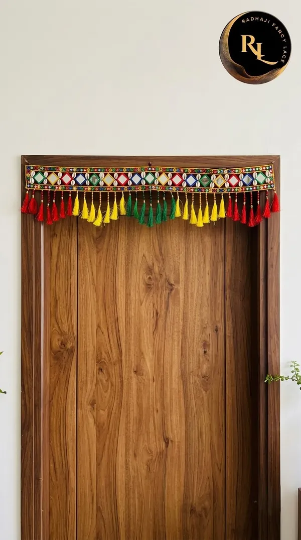 Mirror_and_Cowrie_Shell_(Kavdi)_Door_Toran_/_Bandhanwar_with_Vibrant_Tassels_and_Marigold_Side_Hangings