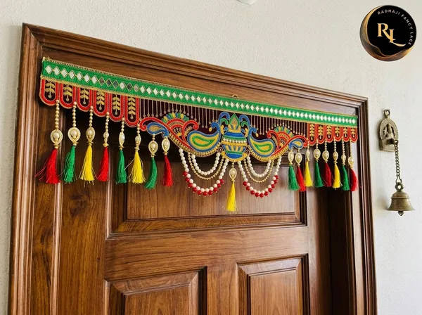 Traditional_Festive_Door_Toran_/_Bandhanwar_with_Kalash,_Royal_Peacock_Motifs,_Cascading_Pearl_Chains,_and_Multicolor_Silk_Tassels_for_Home_Decor