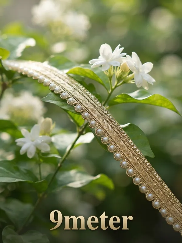 Upgrade_your_ethnic_and_couture_collections_with_this_sophisticated_Multi-Band_Gold_and_Pearl_Lace_Trim._Featuring_a_multi-layered_design_composed_of_a_shimmering_metallic_gold_braid,_a_textured_woven_center_band,_and_a_delicate_beaded_edge_lined_with_luminous_white_pearls,_this_designer_border_brings_refined_elegance_and_dimensional_richness_to_any_garment.