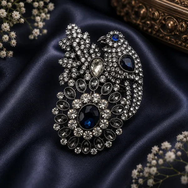 Elegant_Crystal_Peacock_Brooch_with_Blue_Gemstones