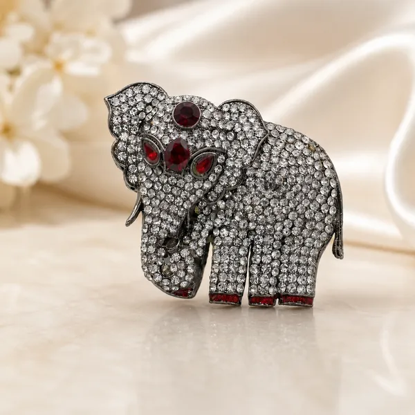 Sparkling_Crystal_Elephant_Brooch_-_Silver_Tone_with_Red_Accents