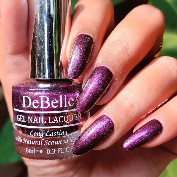 DeBelle_Gel_Nail_Lacquer_Magical_Marina_Dark_Purple_With_Light_Pink_Glitter_8_Ml
