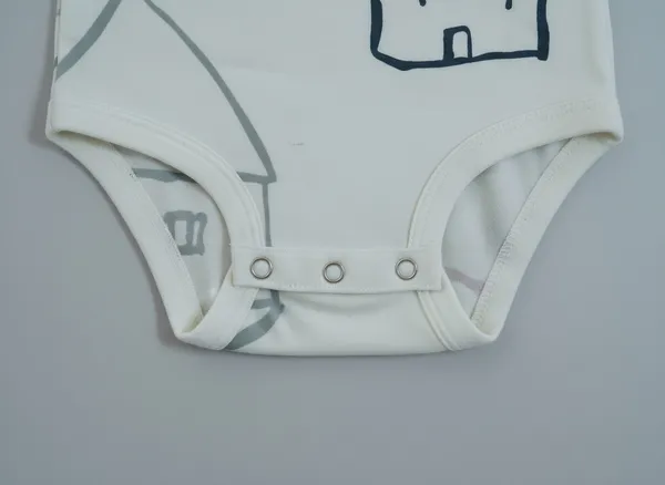 White_Cotton_Baby_Bodysuit_For_Baby_Boys_And_Girls