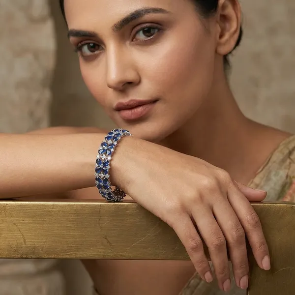 Blue_Stainless_Steel_Sapphire_With_American_Diamond_4_Leaf_Flower_Design_Stone_Bangle