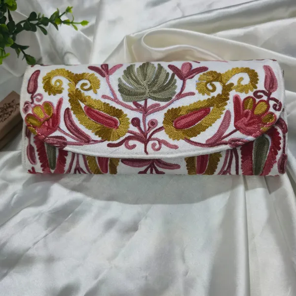 Aura_Hand-Embroidered_Wallet:_Suggests_a_sense_of_refined,_personal_style.