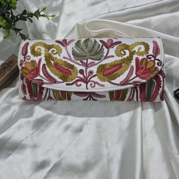 Aura_Hand-Embroidered_Wallet:_Suggests_a_sense_of_refined,_personal_style.