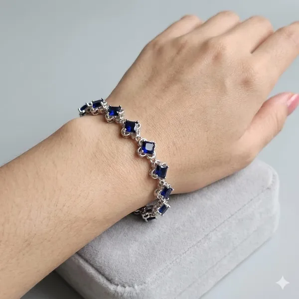 Royal_Azure"_Princess-Cut_Sapphire_Blue_Tennis_Bracelet_in_Floral_Filigree