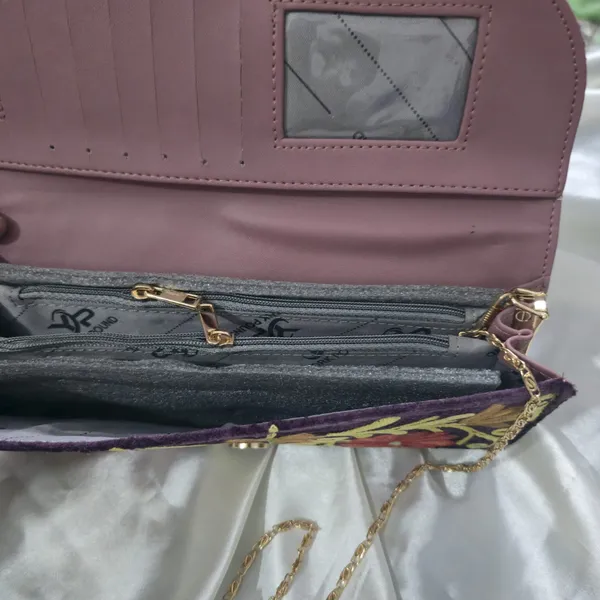 Royal_Plum_Hand-Embroidered_Wallet:_Positions_the_product_as_a_high-end,_regal_accessory.