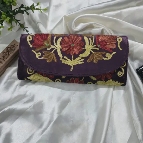 Royal_Plum_Hand-Embroidered_Wallet:_Positions_the_product_as_a_high-end,_regal_accessory.