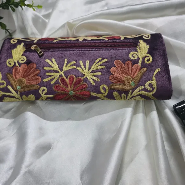 Royal_Plum_Hand-Embroidered_Wallet:_Positions_the_product_as_a_high-end,_regal_accessory.