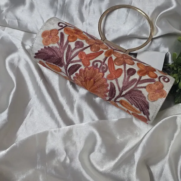 The_Autumn_Ivory_Clutch:
