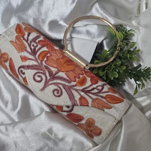 The_Autumn_Ivory_Clutch: