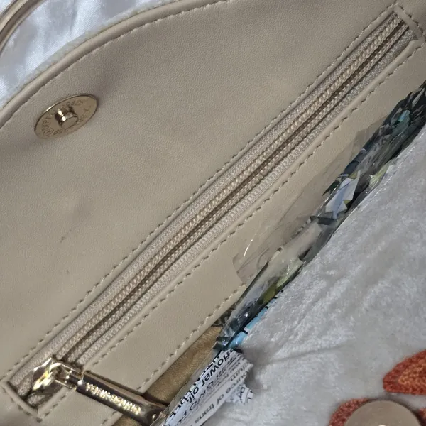 The_Autumn_Ivory_Clutch: