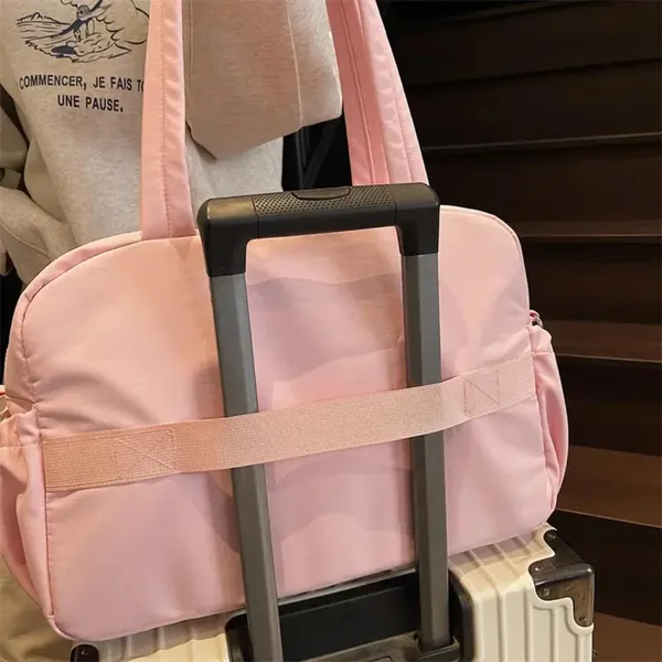Pink_Travel_Duffel_Bag_with_Luggage_Sleeve_and_Shoulder_Strap