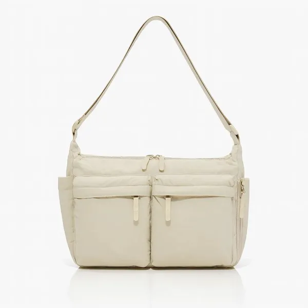 Beige_Diaper_Bag_with_Multiple_Pockets_and_Adjustable_Shoulder_Strap