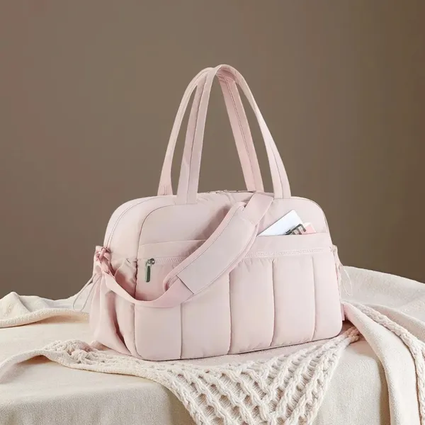 Pink_Travel_Duffel_Bag_with_Luggage_Sleeve_and_Shoulder_Strap